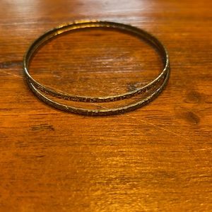 2 gold printed bracelets, minimally used